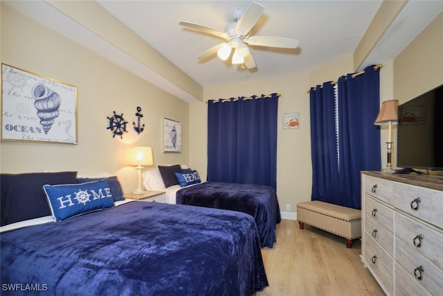 bedroom featuring ceiling fan and light hardwood / wood-style floors