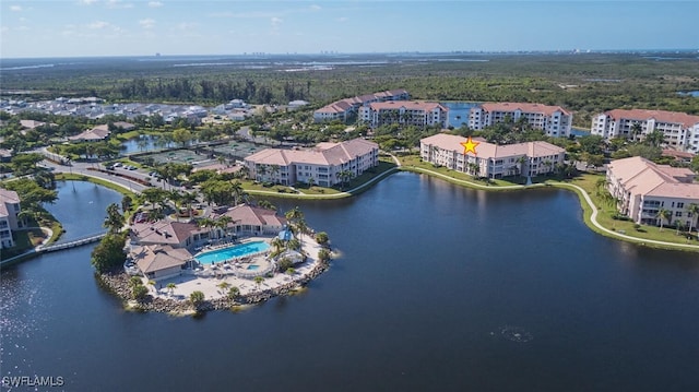 bird's eye view with a water view