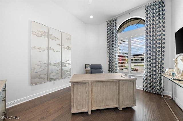 home office featuring dark hardwood / wood-style flooring