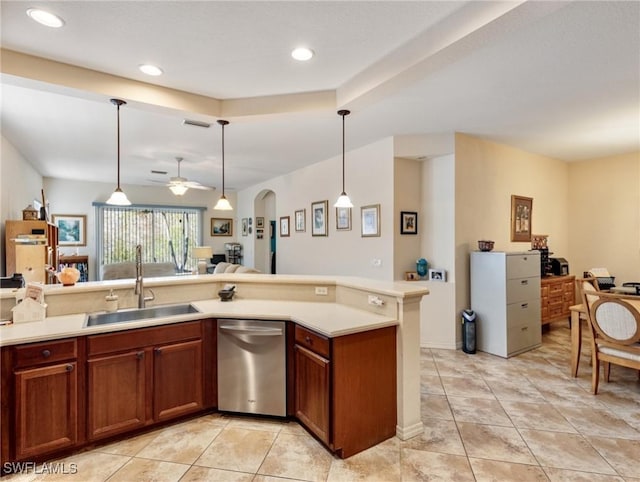 kitchen with light tile patterned flooring, sink, decorative light fixtures, dishwasher, and ceiling fan