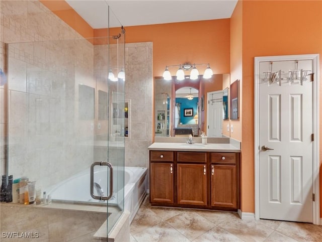 bathroom featuring vanity and plus walk in shower