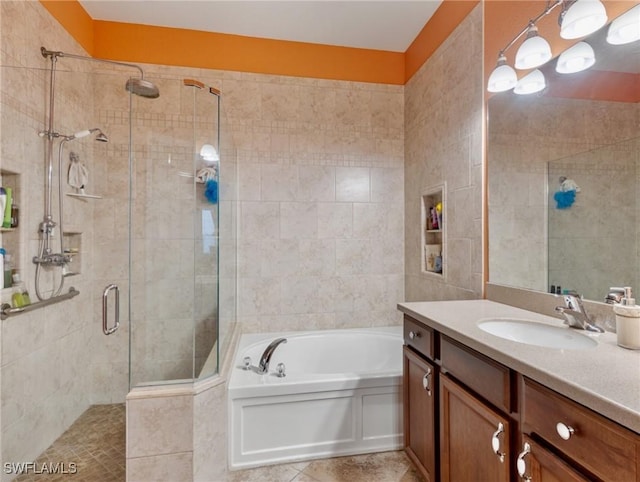 bathroom with vanity, separate shower and tub, and tile patterned floors