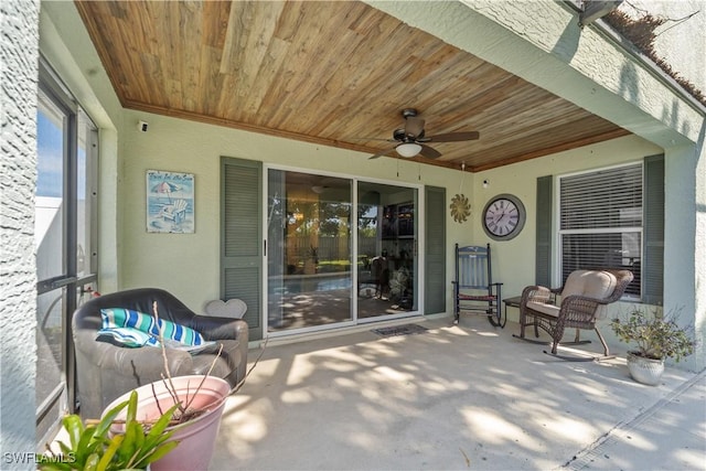 view of patio / terrace featuring ceiling fan