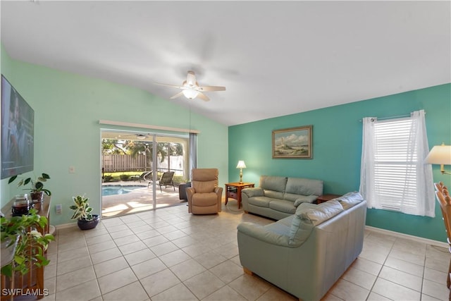 tiled living room featuring vaulted ceiling and ceiling fan