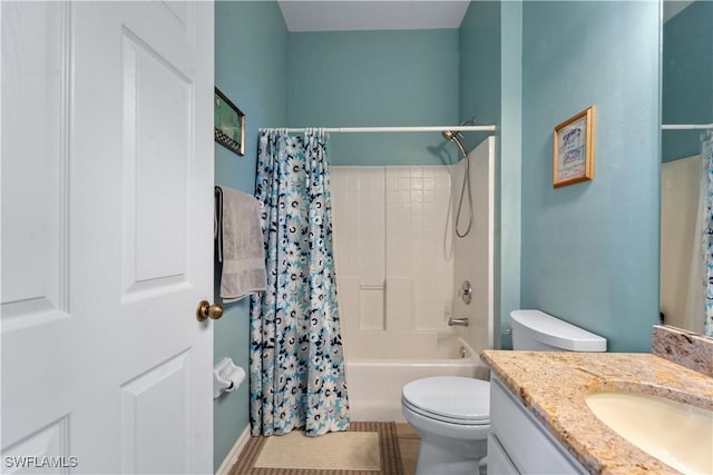 full bathroom featuring vanity, shower / tub combo with curtain, and toilet