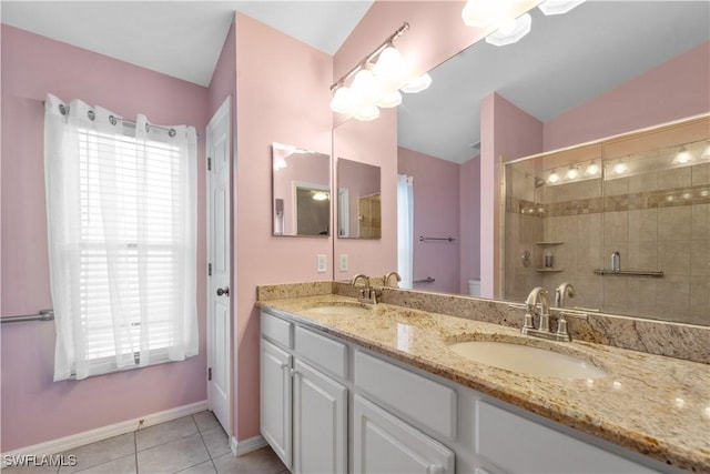 bathroom featuring lofted ceiling, a shower with door, tile patterned flooring, vanity, and toilet