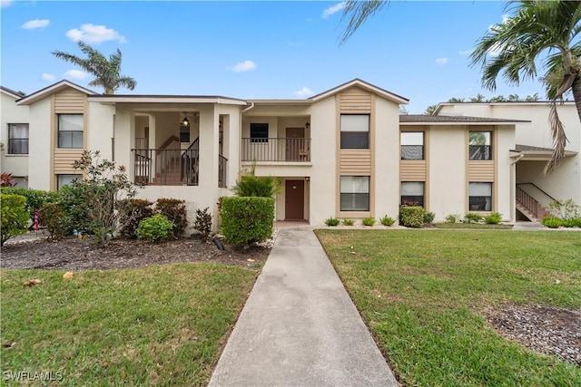 view of property with a front lawn