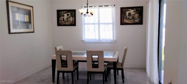 dining room with a chandelier