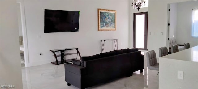 living room featuring a chandelier