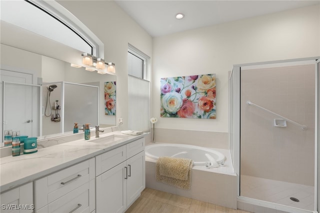 bathroom with vanity, separate shower and tub, and tile patterned floors