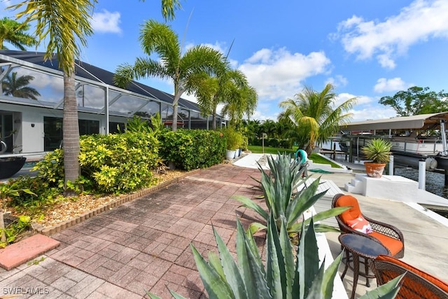 view of property's community with a patio area