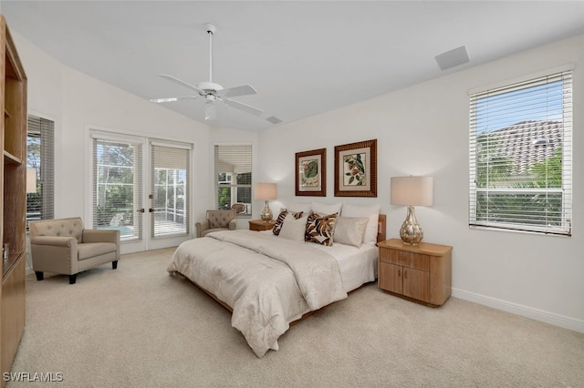 carpeted bedroom featuring access to exterior, french doors, ceiling fan, and vaulted ceiling