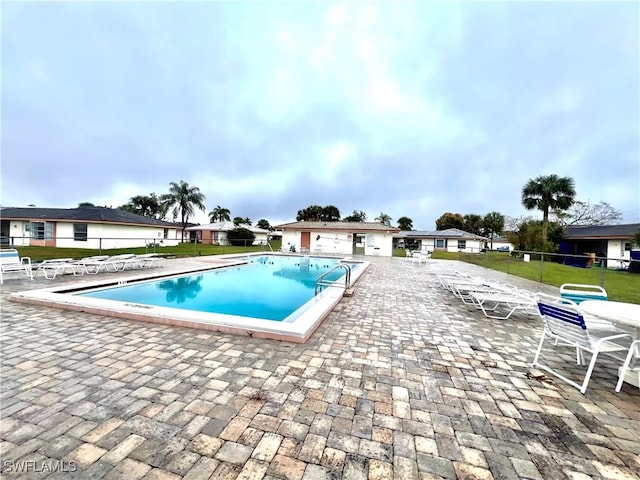 view of swimming pool featuring a patio