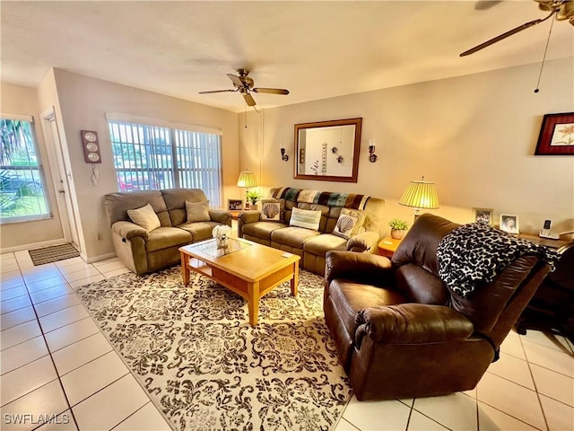 tiled living room featuring ceiling fan