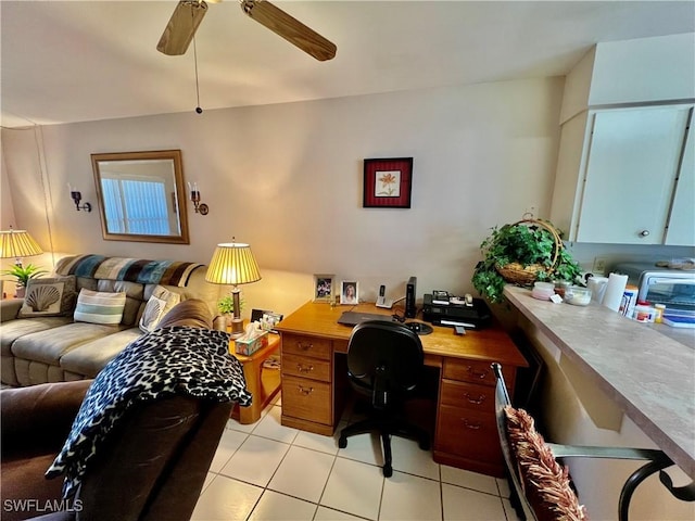 office area featuring ceiling fan and light tile patterned flooring