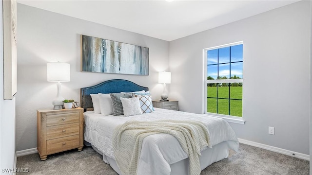 bedroom featuring light carpet