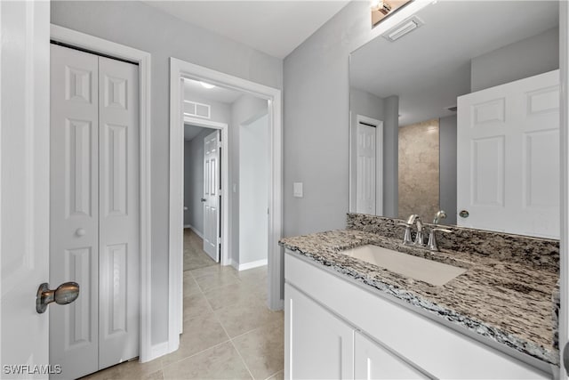 bathroom featuring vanity and tile patterned floors