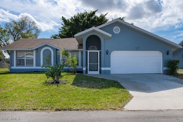 ranch-style house with a garage and a front yard