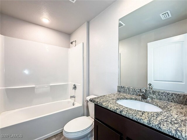 bathroom featuring toilet, shower / tub combination, visible vents, and vanity