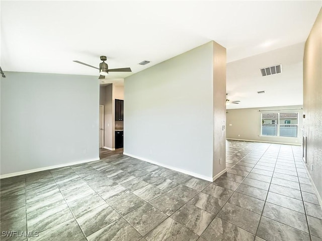 spare room with ceiling fan