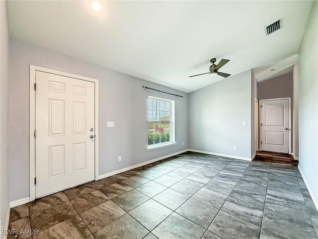 entrance foyer with lofted ceiling and ceiling fan