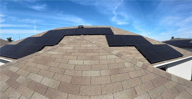 exterior details featuring a shingled roof