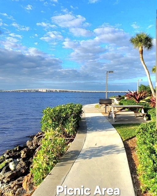 view of property's community featuring a water view