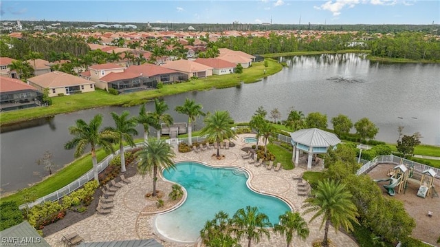 drone / aerial view with a water view