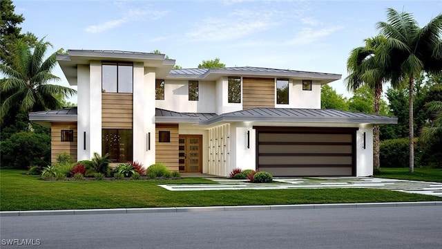 view of front facade with a garage and a front lawn