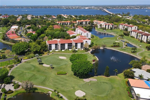 aerial view featuring a water view and view of golf course