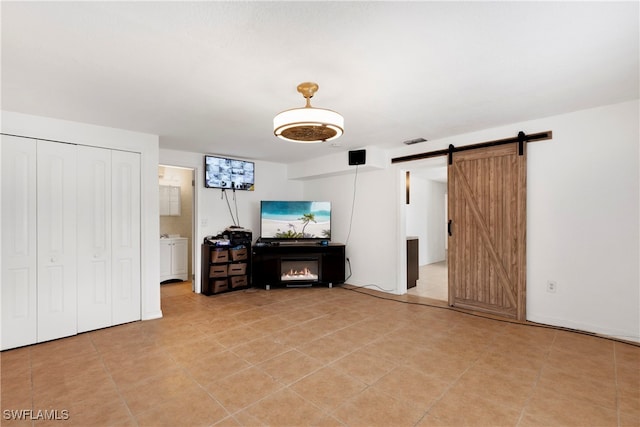 living room featuring a barn door