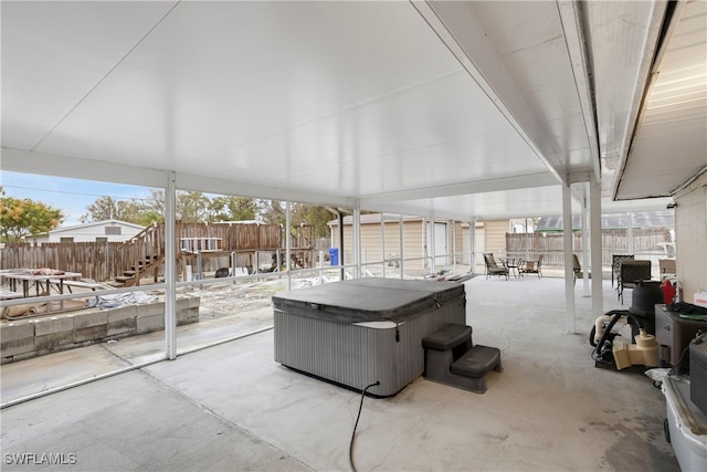 unfurnished sunroom featuring a wealth of natural light