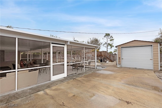 view of patio with a sunroom