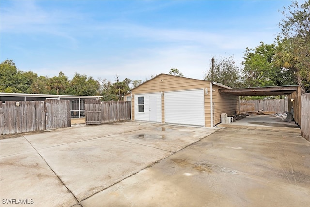 garage with a carport