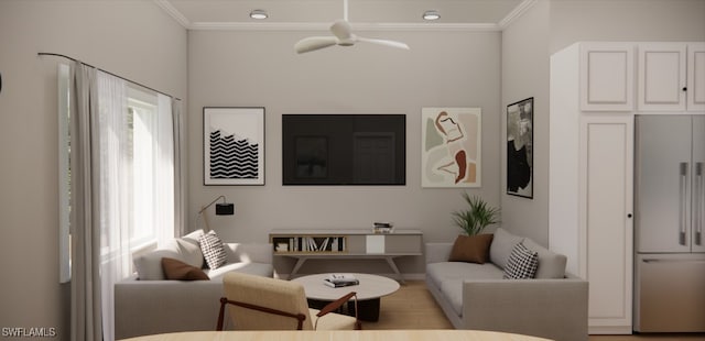 living room with light hardwood / wood-style flooring and ornamental molding