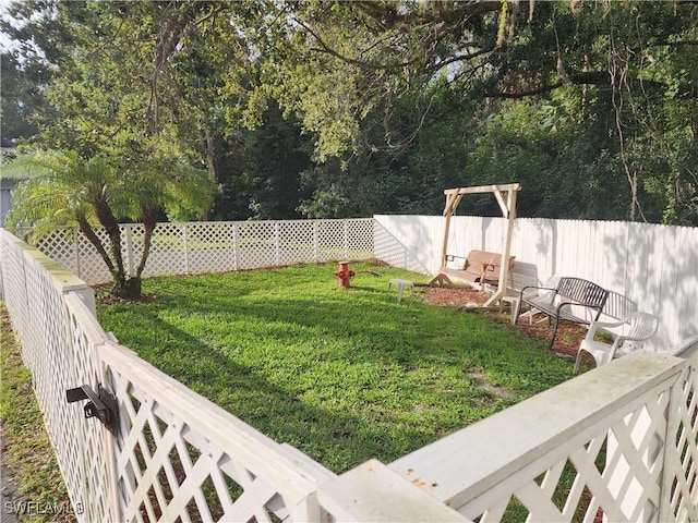 view of yard with fence