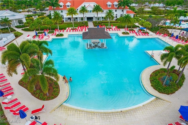 view of pool featuring a patio