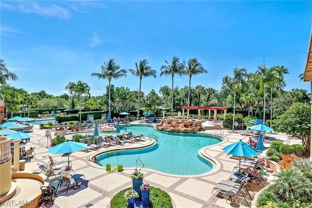 view of swimming pool featuring a patio area