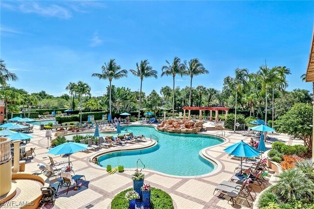 28830 Kiranicola Ct, Bonita Springs, FL 34135 - community pool featuring view of scattered trees