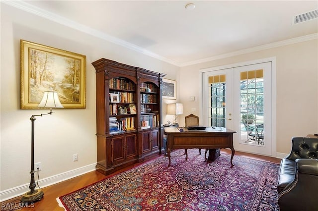 28830 Kiranicola Ct, Bonita Springs, FL 34135 - home office with wood finished floors, ornamental molding, baseboards, and french doors