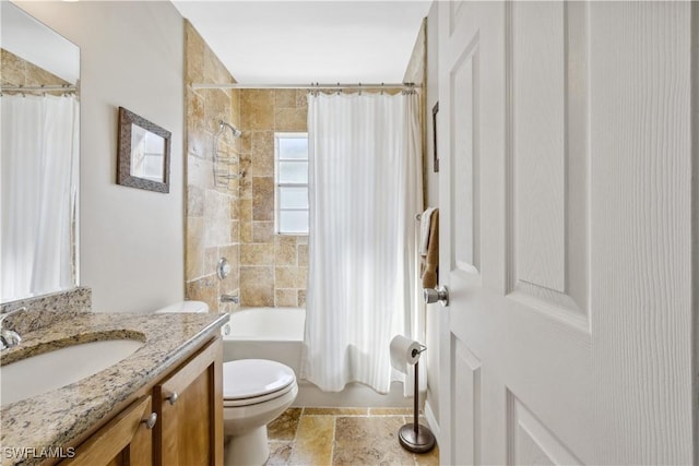 full bathroom featuring vanity, shower / bathtub combination with curtain, and toilet