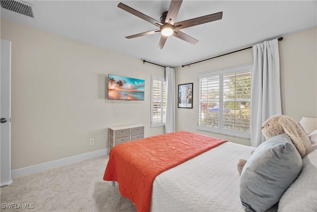 744 Belville Blvd, Naples, FL 34104 - carpeted bedroom featuring ceiling fan