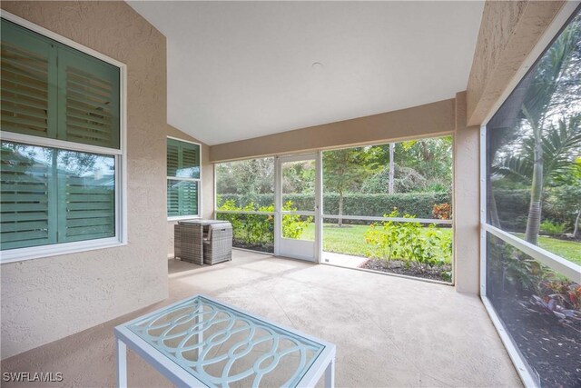 744 Belville Blvd, Naples, FL 34104 - sunroom / solarium featuring lofted ceiling