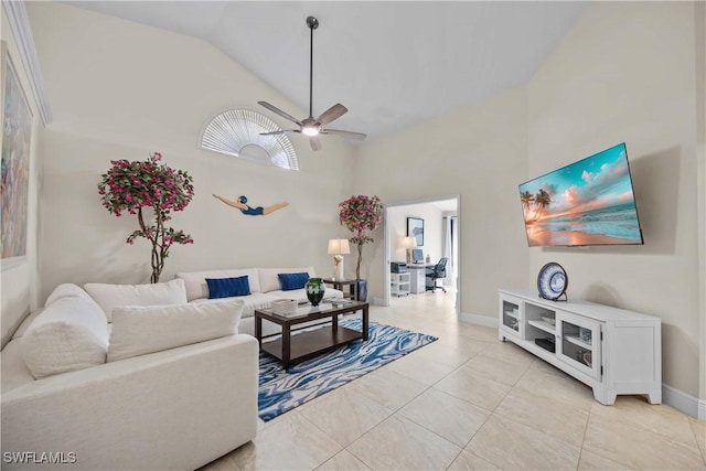 744 Belville Blvd, Naples, FL 34104 - tiled living room featuring ceiling fan and high vaulted ceiling