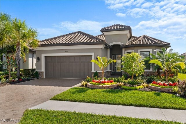 mediterranean / spanish-style house featuring a garage