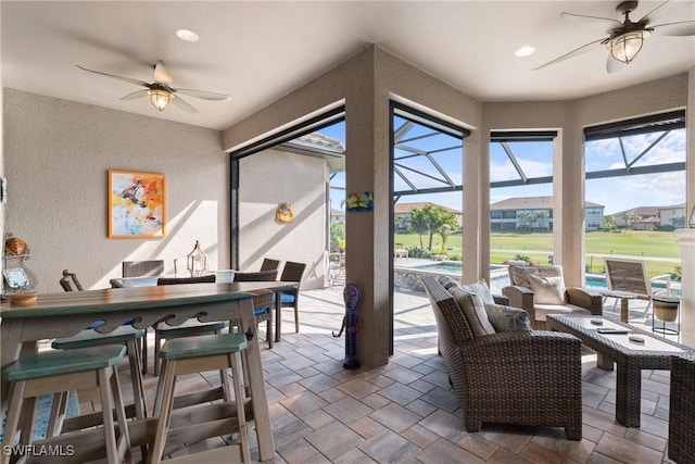 interior space featuring ceiling fan