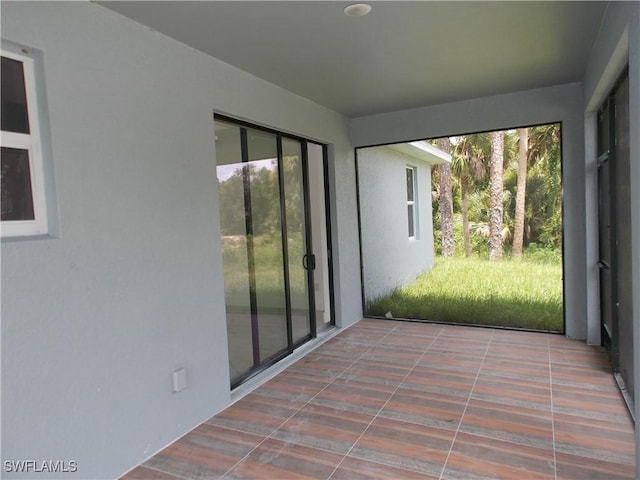 view of unfurnished sunroom