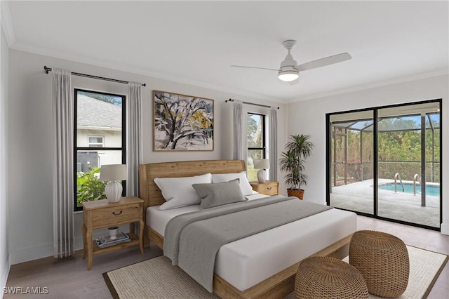 bedroom with access to outside, ornamental molding, a ceiling fan, and baseboards