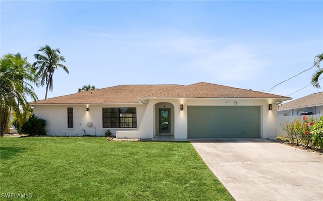 4742 25th Ave SW, Naples, FL 34116 - single story home with a front yard, an attached garage, driveway, and stucco siding