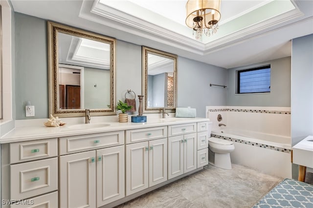 bathroom featuring a relaxing tiled tub, vanity, ornamental molding, toilet, and a chandelier